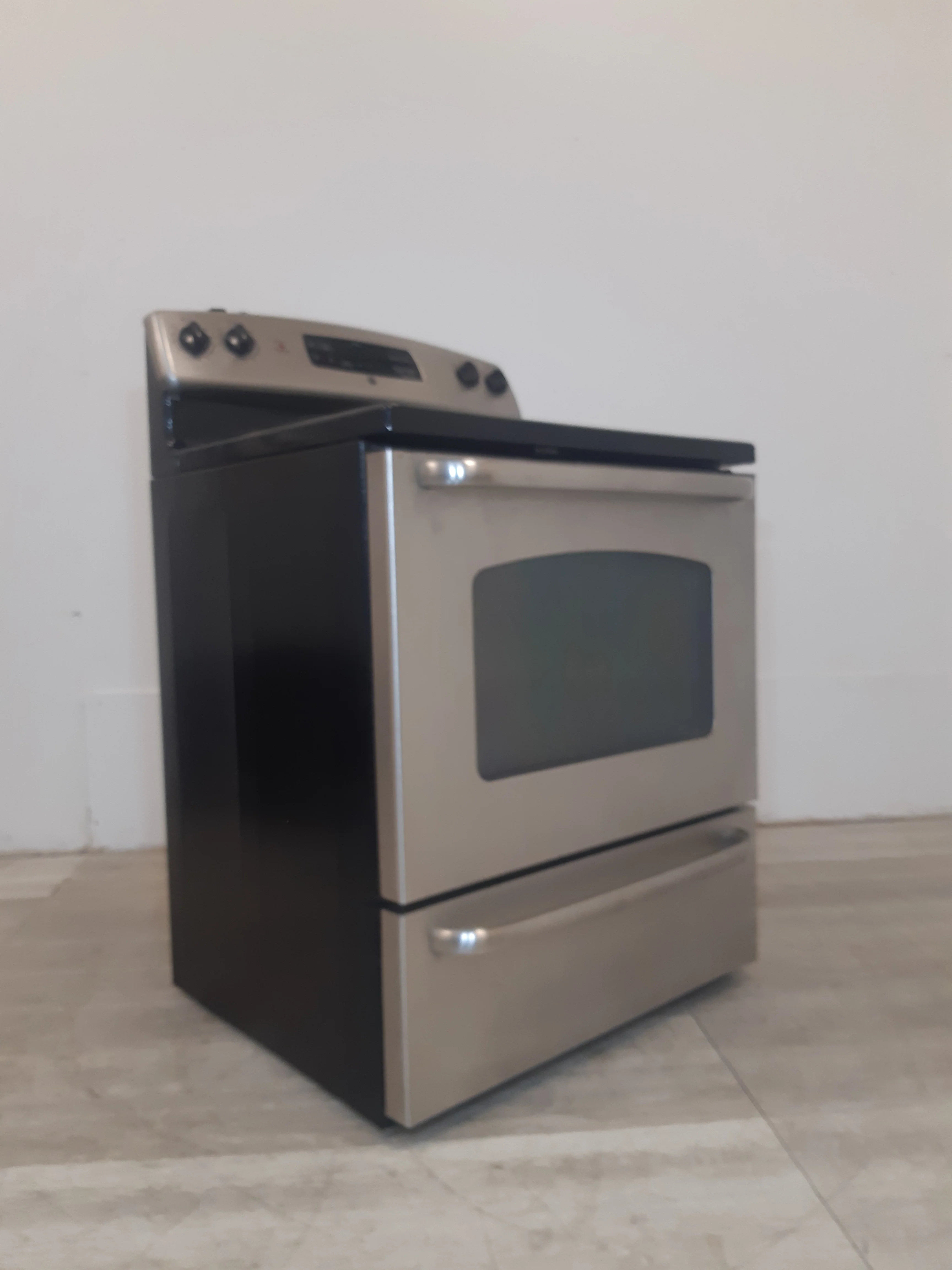 GE Electric Stainless Steel Stove - Image 6