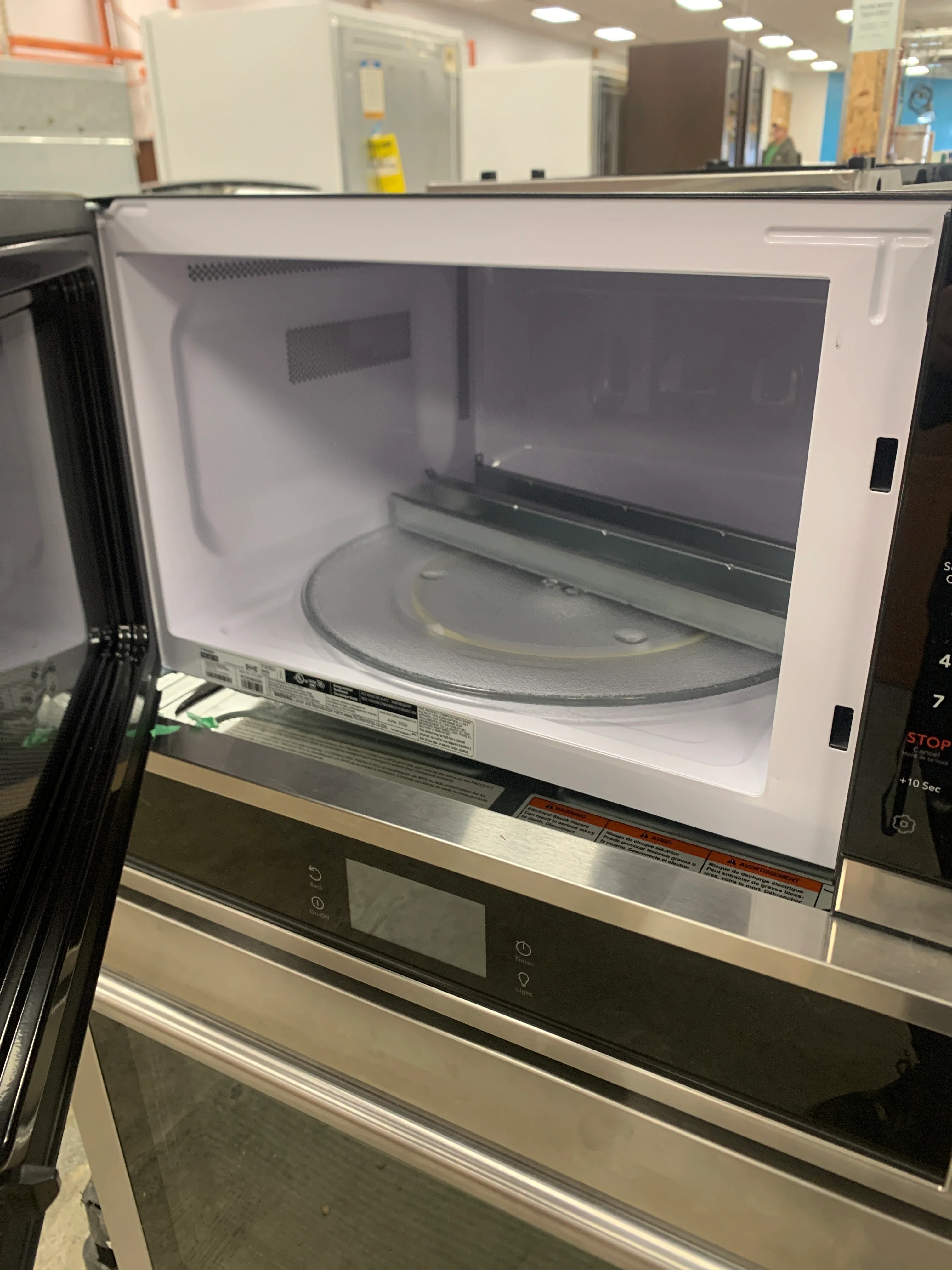 Stainless Steel And Black Microwave - Image 3