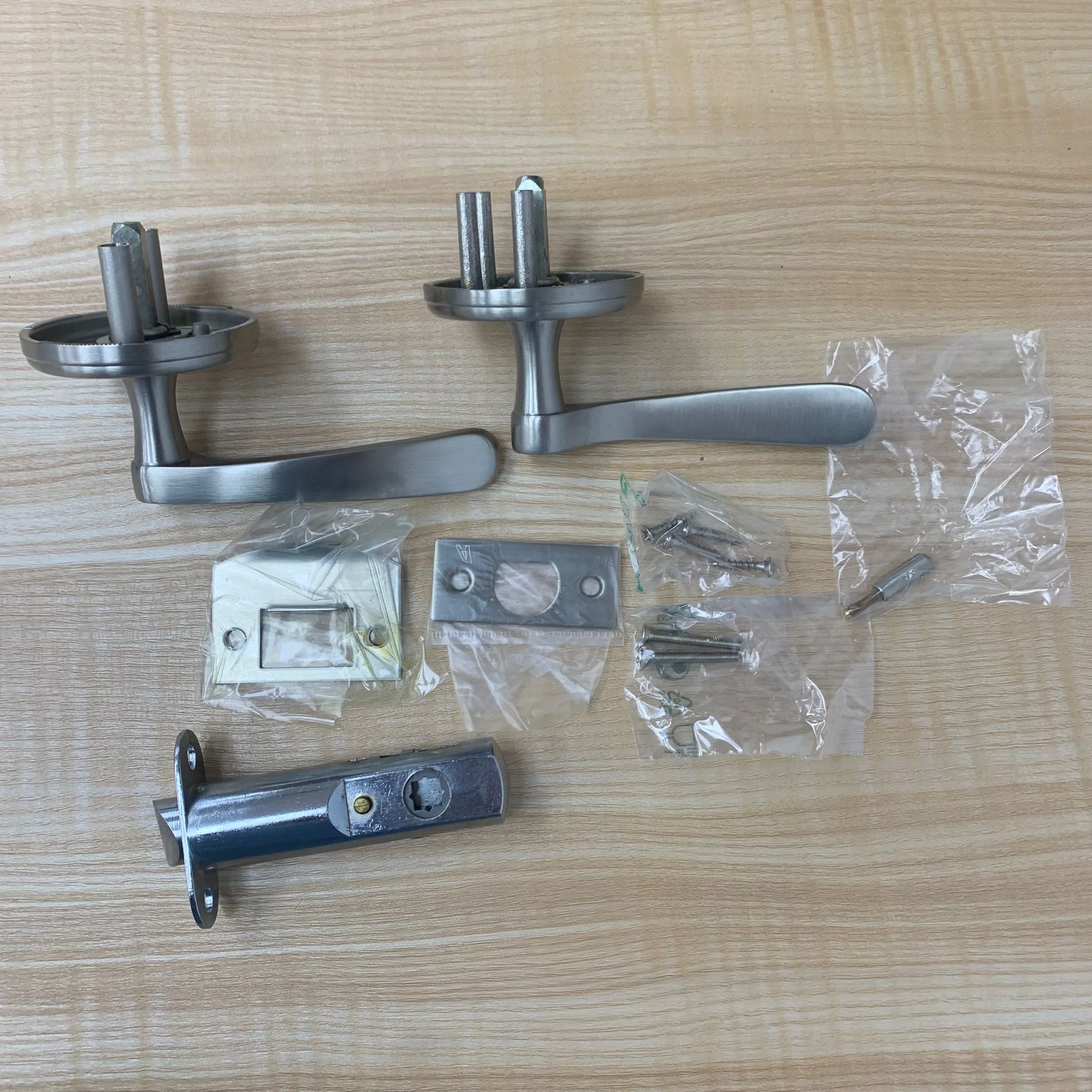 Woodbridge Passage Door Lever Set - Left Hand, Satin Nickel 2001WDGTRE